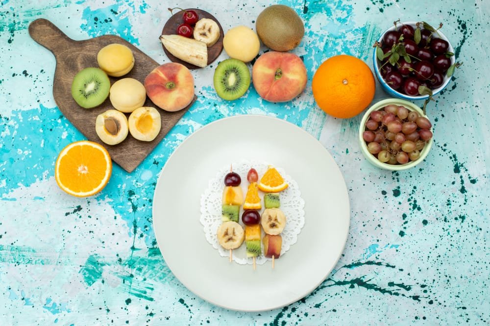 A colorful fruit platter highlighting low-carb fruits.